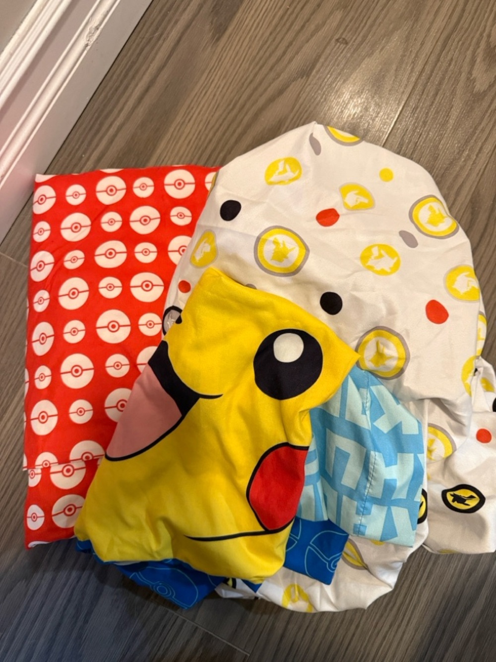 White Polka Dot Fabric with Yellow Pikachu Silhouettes